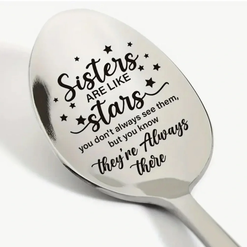 Silver toned Serving Spoon with Engraved Design